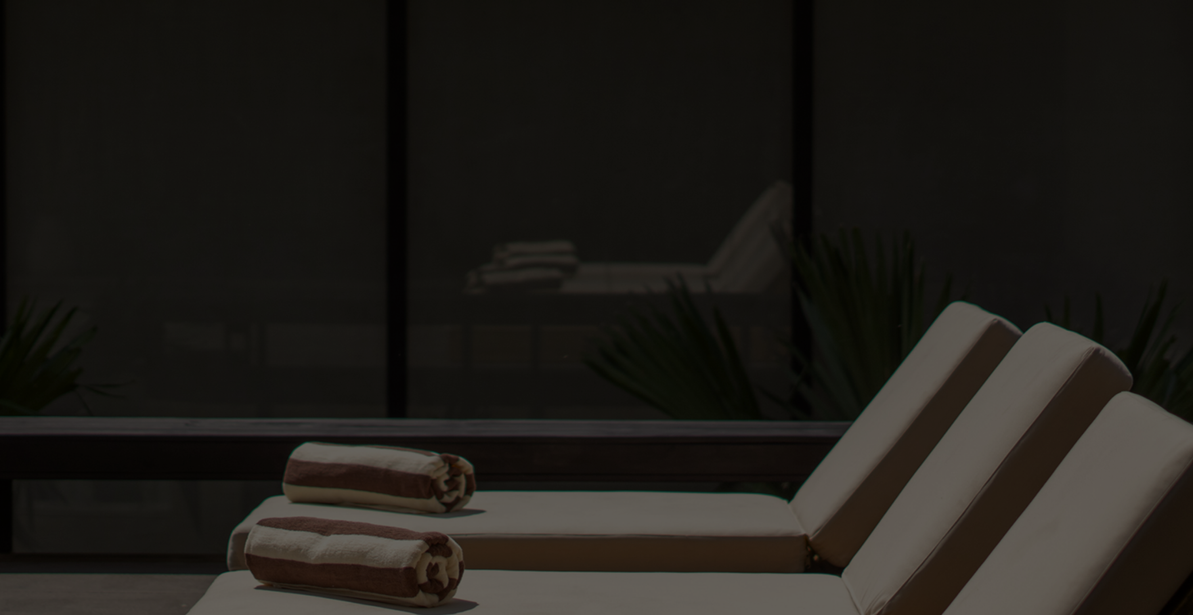 Pool chairs at a luxury villa